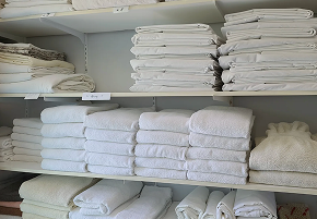 Stacked linens for camp, hospital and office delivery